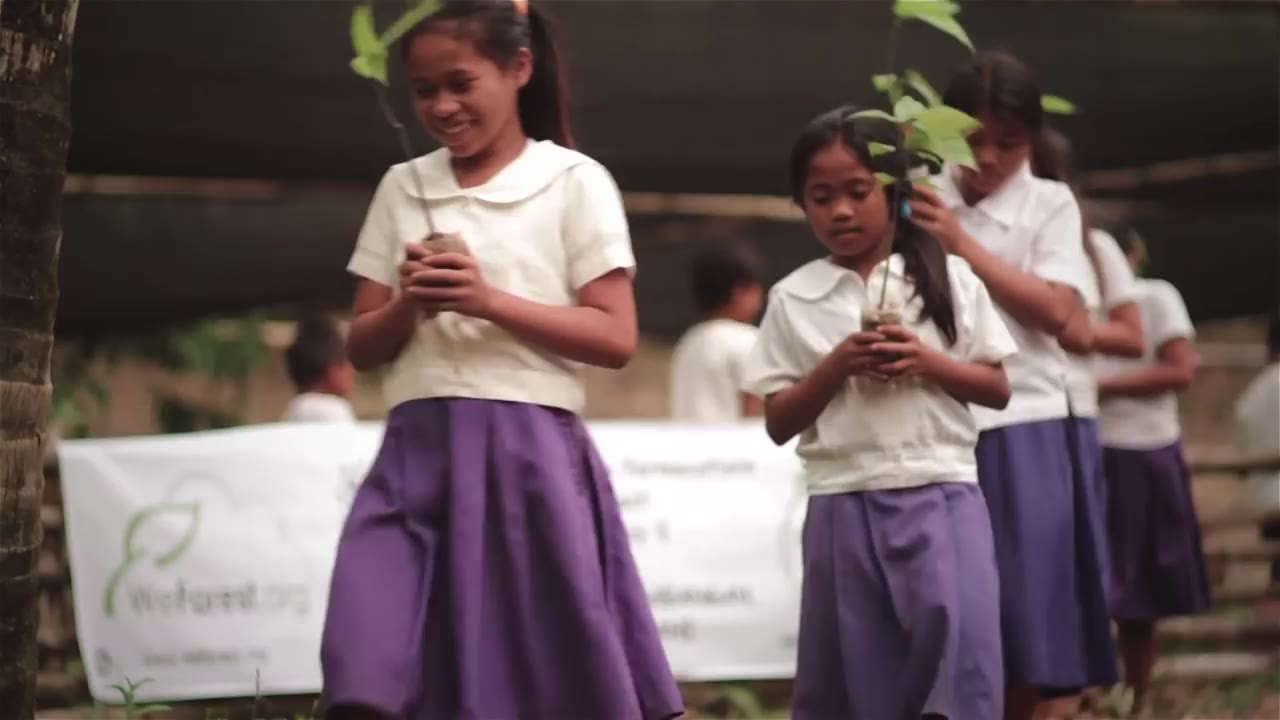 Pupils planting young trees